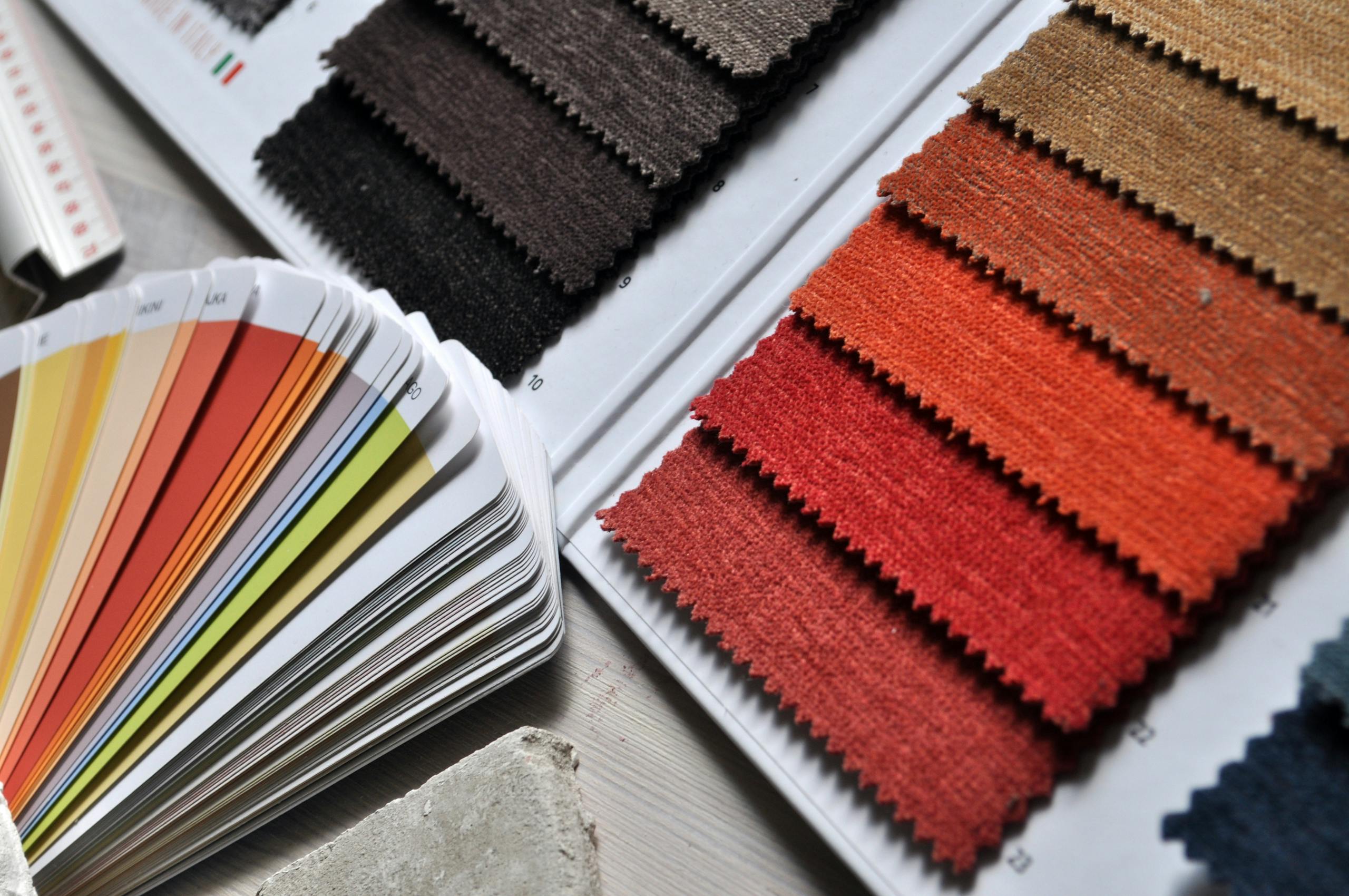 Close-up of fabric swatches and color palette, ideal for interior design and textile projects.